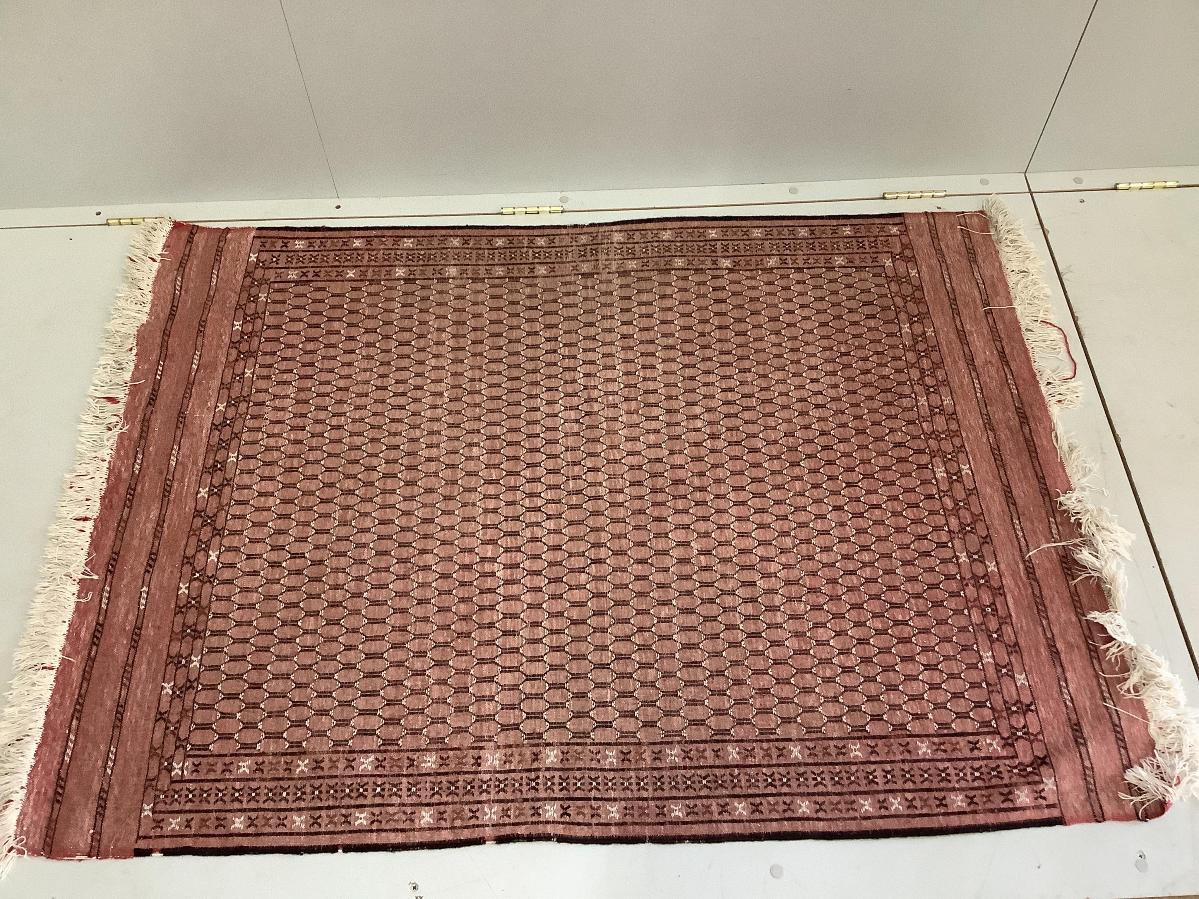 An antique Caucasian rug, Belouch mat and one other, largest 180 x 120cm. Condition - poor to good
